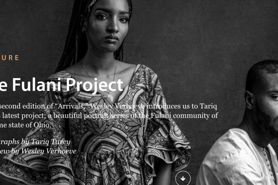 A woman wearing a swirled and striped dress gazes at the camera, while a man sits to her left looking toward the side. Both are Black Fulani people. The words "The Fulani Project" appear alongside the article author's name and photographer's name (Tariq Tarey). The photo is in black and white.